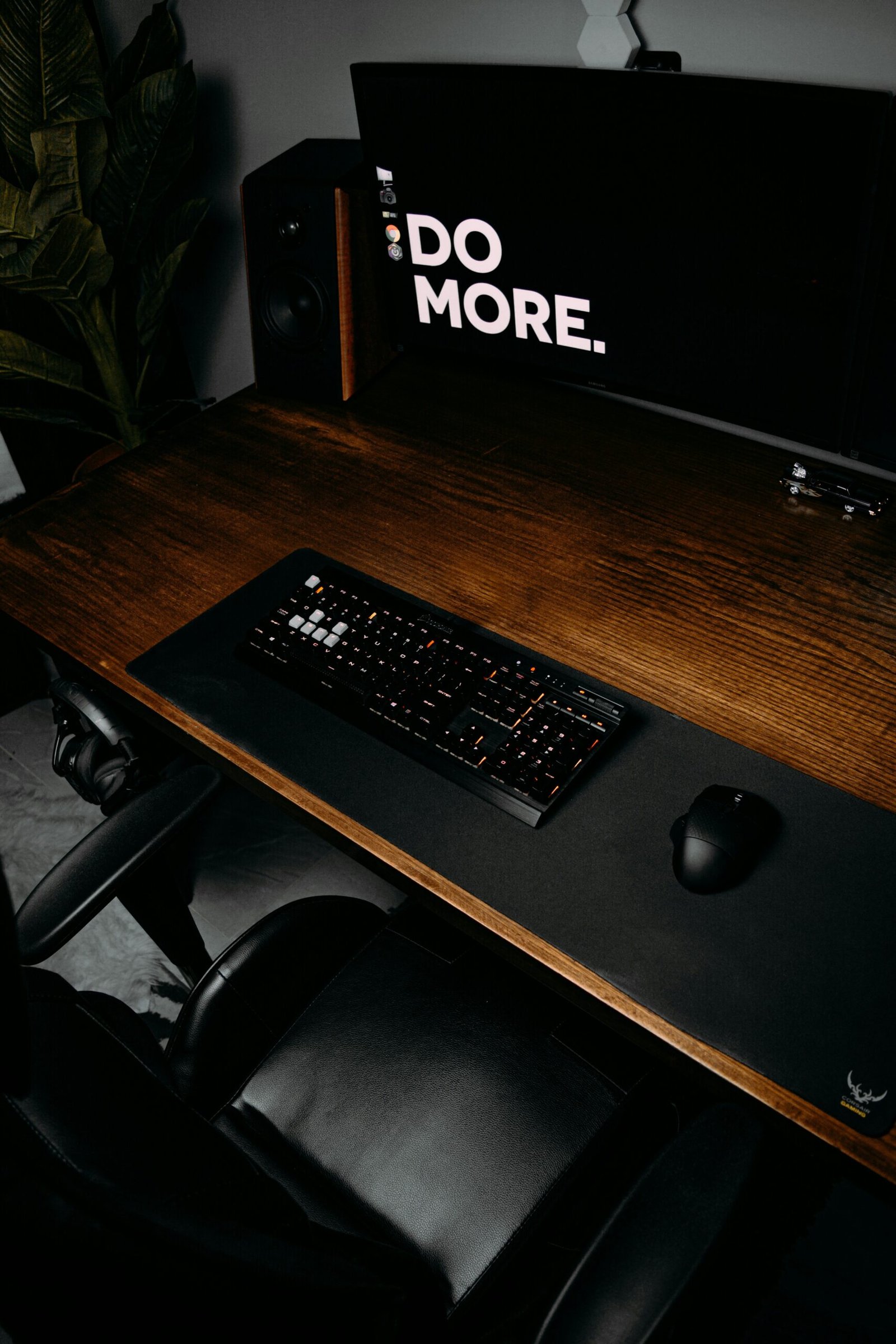 black computer keyboard on brown wooden desk